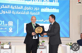 Receiving the Egyptian Cabinet shield and signing a cooperation agreement